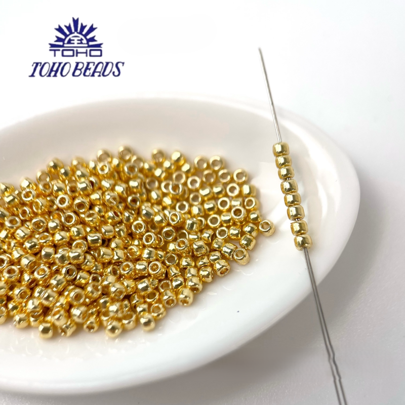 TOHO Seed Beads PF557, Tarnish-Resistant Gold/Silver