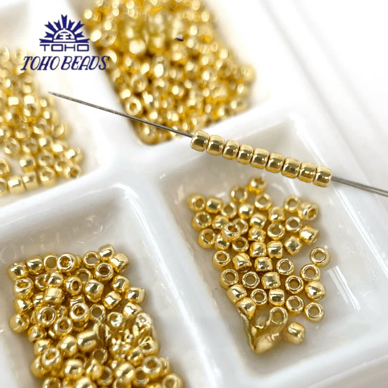 TOHO Seed Beads PF557, Tarnish-Resistant Gold/Silver