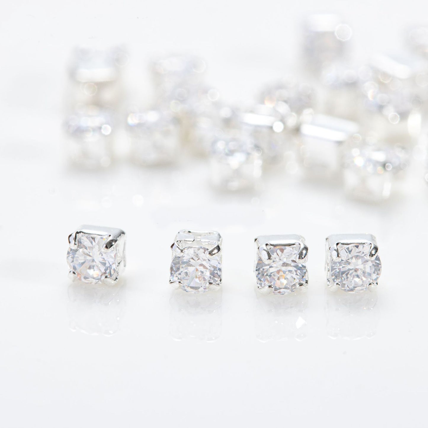 2.5mm 4-prong round zircon beads