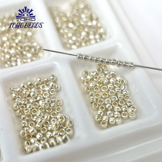 TOHO Seed Beads PF557, Tarnish-Resistant Gold/Silver