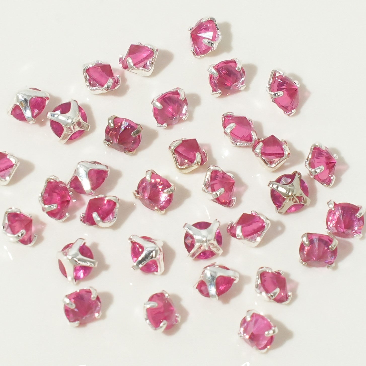 (100pcs)4mm Round Reverse Prong-Set CZ