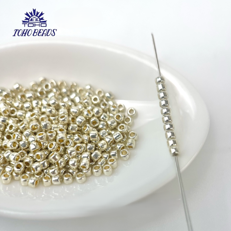 TOHO Seed Beads PF557, Tarnish-Resistant Gold/Silver