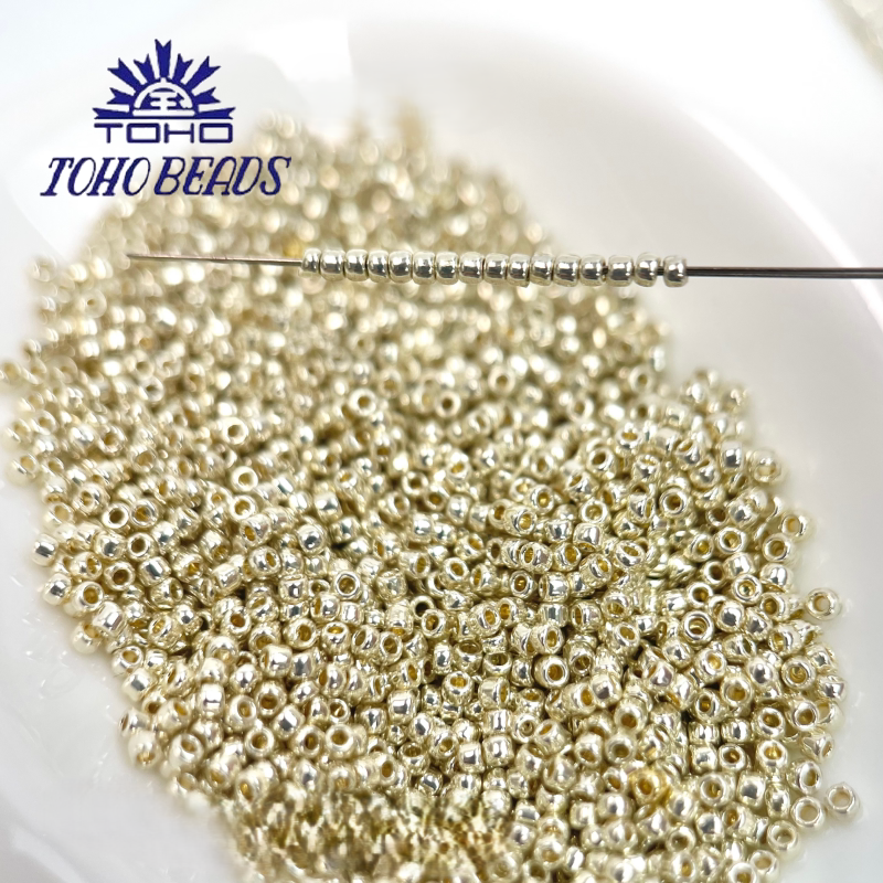 TOHO Seed Beads PF557, Tarnish-Resistant Gold/Silver